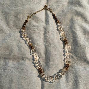 Pretty clear glass bead necklace with lovely bronze colored beads.21 inches.